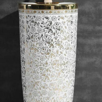 White and gold pedestal basin